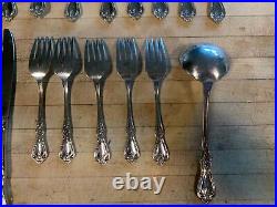 23 pieces of Kennett Square Distinction Deluxe HH Oneida Stainless withGravy Ladle