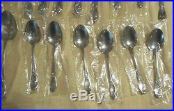 26 Pieces in the Calla Lily Pattern Oneida Deluxe Stainless Flatware Unused