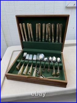 65 Pc Oneida 18/10 Stainless/gold trimmed Flatware Set in wood box
