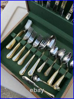65 Pc Oneida 18/10 Stainless/gold trimmed Flatware Set in wood box