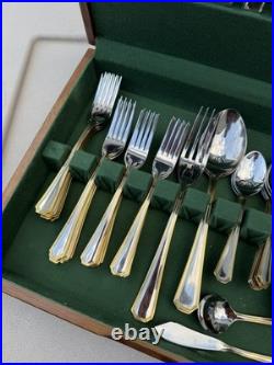 65 Pc Oneida 18/10 Stainless/gold trimmed Flatware Set in wood box