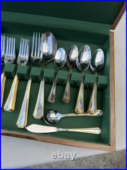 65 Pc Oneida 18/10 Stainless/gold trimmed Flatware Set in wood box