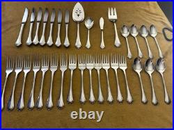 (7) 4 Piece Settings (withteaspoons) +serv ONEIDA Falkirk Stainless Steel Flatware