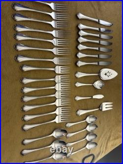 (7) 4 Piece Settings (withteaspoons) +serv ONEIDA Falkirk Stainless Steel Flatware