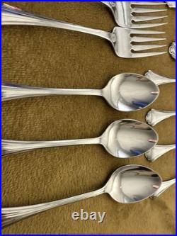 (7) 4 Piece Settings (withteaspoons) +serv ONEIDA Falkirk Stainless Steel Flatware