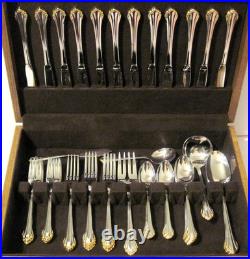 Golden Clarette 64 piece Set Service for 12 Oneida Stainless Flatware Never Used