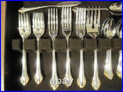 Golden Clarette 64 piece Set Service for 12 Oneida Stainless Flatware Never Used
