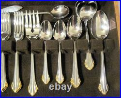 Golden Clarette 64 piece Set Service for 12 Oneida Stainless Flatware Never Used