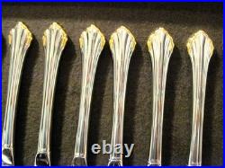 Golden Clarette 64 piece Set Service for 12 Oneida Stainless Flatware Never Used