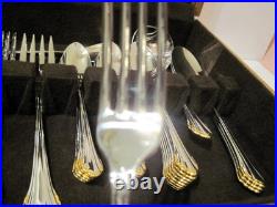 Golden Clarette 64 piece Set Service for 12 Oneida Stainless Flatware Never Used