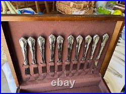 Oneida 69 pc stainless steel silverware and wooden carrier vintage