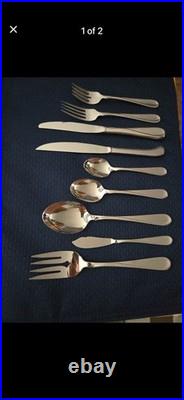Oneida Flight Satin service for 8. Silver Stainless Steel Set