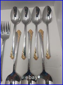 Oneida Golden Demask Rose Flatware service for four missing one spoon 19 piece