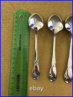 SET OF (7) ONEIDA Deluxe GOLDEN CALLA LILY TEASPOONS Stainless Flatware