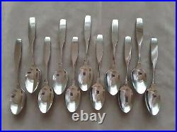 Service for 8 + extras in Oneida Community Stainless Paul Revere Pattern