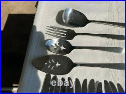 Vintage Oneida stainless steel 12 place with extras satin handles excellent cond