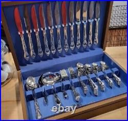 WM ROGERS ONEIDA STAINLESS FLATWARE SET MONTCLAIR FLORAL TIP with chest box set