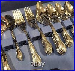 WM ROGERS ONEIDA STAINLESS FLATWARE SET MONTCLAIR FLORAL TIP with chest box set